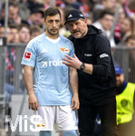 21.03.2026, Fussball Bundesliga 2025/2026, 27.Spieltag, FC Bayern München - 1.FC Union Berlin, in der Allianz-Arena München, v.li: Josip Juranovic (Union Berlin) bei Trainer Steffen Baumgart (Union Berlin) 