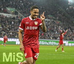 22.03.2026, Fussball 1. Bundesliga 2025/2026, 27.Spieltag, FC Augsburg - VfB Stuttgart, in der WWK-Arena Augsburg. Nikolas Nartey (Stuttgart) jubelt.
 

