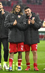 22.03.2026, Fussball 1. Bundesliga 2025/2026, 27.Spieltag, FC Augsburg - VfB Stuttgart, in der WWK-Arena Augsburg. v.l. Lorenz Assignon (Stuttgart) und Deniz Undav (Stuttgart) jubeln zum Schluss
 

