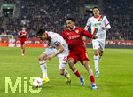 22.03.2026, Fussball 1. Bundesliga 2025/2026, 27.Spieltag, FC Augsburg - VfB Stuttgart, in der WWK-Arena Augsburg. v.li: Keven Schlotterbeck (FC Augsburg) gegen Tiago Tomas (Stuttgart) 
