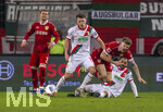 22.03.2026, Fussball 1. Bundesliga 2025/2026, 27.Spieltag, FC Augsburg - VfB Stuttgart, in der WWK-Arena Augsburg. von links:  Maximilian Mittelstädt (Stuttgart), Robin Fellhauer (Augsburg), Finn Jeltsch (Stuttgart),  Alexis Julian Claude-Maurice (FC Augsburg) 