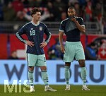 27.03.2026, Fussball Freundschafts-Länderspiel, Schweiz - Deutschland, im Stadion St.-Jakob-Park in Basel (Schweiz). v.l.  Angelo Stiller (Deutschland) und Jonathan Tah (Deutschland) sind nachdenklich.