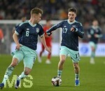 27.03.2026, Fussball Freundschafts-Länderspiel, Schweiz - Deutschland, im Stadion St.-Jakob-Park in Basel (Schweiz). v.l. Joshua Kimmich (Deutschland) und Florian Wirtz (Deutschland) am Ball.