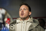 27.03.2026, Fussball Freundschafts-Länderspiel, Schweiz - Deutschland, im Stadion St.-Jakob-Park in Basel (Schweiz). Trainer Julian Nagelsmann (Deutschland) singt die Nationalhymne mit 