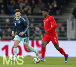27.03.2026, Fussball Freundschafts-Länderspiel, Schweiz - Deutschland, im Stadion St.-Jakob-Park in Basel (Schweiz). v.li: Angelo Stiller (Deutschland) gegen Breel Embolo (Schweiz) 