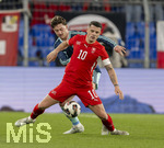 27.03.2026, Fussball Freundschafts-Länderspiel, Schweiz - Deutschland, im Stadion St.-Jakob-Park in Basel (Schweiz). hi: Angelo Stiller (Deutschland) gegen Granit Xhaka (Schweiz) 