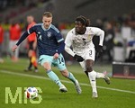 30.03.2026, Fussball Freundschafts-Länderspiele 2.Spieltag, Deutschland - Ghana, in der MHP-Arena Stuttgart (Deutschland). v.l. Chris Führich (Deutschland) gegen Caleb Yirenkyi (Ghana) 