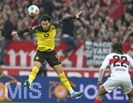 04.04.2026, Fussball 1. Bundesliga 2025/2026, 28.Spieltag, VfB Stuttgart - Borussia Dortmund, in der MHP-Arena Stuttgart, v.l. Ramy Bensebaini (Borussia Dortmund) gegen Lorenz Assignon (Stuttgart) 
 

