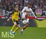 04.04.2026, Fussball 1. Bundesliga 2025/2026, 28.Spieltag, VfB Stuttgart - Borussia Dortmund, in der MHP-Arena Stuttgart, v.l. Daniel Svensson (Borussia Dortmund) gegn Lorenz Assignon (Stuttgart) 
 

