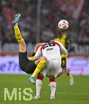 04.04.2026, Fussball 1. Bundesliga 2025/2026, 28.Spieltag, VfB Stuttgart - Borussia Dortmund, in der MHP-Arena Stuttgart, v.l. Ramy Bensebaini (Borussia Dortmund) gegen Deniz Undav (Stuttgart) 
 

