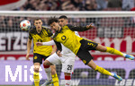 04.04.2026, Fussball 1. Bundesliga 2025/2026, 28.Spieltag, VfB Stuttgart - Borussia Dortmund, in der MHP-Arena Stuttgart, Ramy Bensebaini (Borussia Dortmund) liegt quer in der Luft gegen Deniz Undav (Stuttgart), li: Nico Schlotterbeck (Borussia Dortmund) 