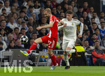 07.04.2026, Fussball UEFA Championsleague 2025/2026: Viertelfinale, Real Madrid - FC Bayern München, im Estadio Bernabeu in Madrid (Spanien),  v.lI. Konrad Laimer (FC Bayern München) gegen Federico Valverde (Real Madrid) 
  

