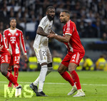 07.04.2026, Fussball UEFA Championsleague 2025/2026: Viertelfinale, Real Madrid - FC Bayern München, im Estadio Bernabeu in Madrid (Spanien),  
  v.li: Antonio Rüdiger (Real Madrid) gegen Jonathan Tah (FC Bayern München) 