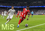 07.04.2026, Fussball UEFA Championsleague 2025/2026: Viertelfinale, Real Madrid - FC Bayern München, im Estadio Bernabeu in Madrid (Spanien),  v.li: Eder Militao (Real Madrid) gegen Alphonso Davies (FC Bayern München) 
  
