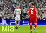 07.04.2026, Fussball UEFA Championsleague 2025/2026: Viertelfinale, Real Madrid - FC Bayern München, im Estadio Bernabeu in Madrid (Spanien),  Dean Huijsen (Real Madrid) gibt Anweisungen, zeigt, gestikuliert, gibt Kommandos, Anweisungen, gibt Anweisungen, zeigend, gestikulierend,  
  
