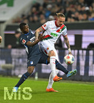 10.04.2026, Fussball 1. Bundesliga 2025/2026, 29.Spieltag, FC Augsburg - TSG 1899 Hoffenheim, in der WWK-Arena Augsburg. v.l. Bazoumana Toure (TSG 1899 Hoffenheim) gegen Marius Wolf (FC Augsburg) 
 

