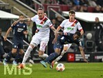 10.04.2026, Fussball 1. Bundesliga 2025/2026, 29.Spieltag, FC Augsburg - TSG 1899 Hoffenheim, in der WWK-Arena Augsburg. v.l. Marius Wolf (FC Augsburg) gegen Bazoumana Toure (TSG 1899 Hoffenheim) 
 

