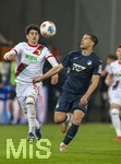 10.04.2026, Fussball 1. Bundesliga 2025/2026, 29.Spieltag, FC Augsburg - TSG 1899 Hoffenheim, in der WWK-Arena Augsburg. v.li: Rodrigo Duarte Ribeiro  (FC Augsburg) gegen Robin Hranac (TSG 1899 Hoffenheim) 