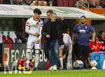 10.04.2026, Fussball 1. Bundesliga 2025/2026, 29.Spieltag, FC Augsburg - TSG 1899 Hoffenheim, in der WWK-Arena Augsburg. v.li: Rodrigo Duarte Ribeiro  (FC Augsburg) und Trainer Manuel Baum (FC Augsburg) am Spielfeldrand 