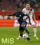 10.04.2026, Fussball 1. Bundesliga 2025/2026, 29.Spieltag, FC Augsburg - TSG 1899 Hoffenheim, in der WWK-Arena Augsburg. v.li: Bazoumana Toure (TSG 1899 Hoffenheim) gegen Arthur Chaves (FC Augsburg) 