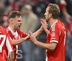 15.04.2026,  Fussball UEFA Championsleague 2025/2026: Viertelfinale Rückspiel,  FC Bayern München - Real Madrid, in der Allianz-Arena München, v.l. Joshua Kimmich (FC Bayern München) und Harry Kane (FC Bayern München) jubeln
  

