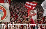 15.04.2026,  Fussball UEFA Championsleague 2025/2026: Viertelfinale Rückspiel,  FC Bayern München - Real Madrid, in der Allianz-Arena München, Die Südkurve in rot
  

