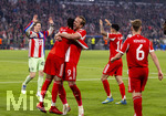 15.04.2026,  Fussball UEFA Championsleague 2025/2026: Viertelfinale Rückspiel,  FC Bayern München - Real Madrid, in der Allianz-Arena München, Frenetischer Schlussjubel bei den Bayern nach dem 4:3 Siegtreffer, Alphonso Davies (FC Bayern München), Harry Kane (FC Bayern München), Joshua Kimmich (FC Bayern München) 