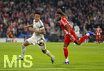 15.04.2026,  Fussball UEFA Championsleague 2025/2026: Viertelfinale Rückspiel,  FC Bayern München - Real Madrid, in der Allianz-Arena München, Eder Militao (Real Madrid) am Ball gegen Alphonso Davies (FC Bayern München) 