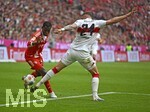 19.04.2026, Fussball Bundesliga 2025/2026, 30.Spieltag, FC Bayern München - VfB Stuttgart, in der Allianz-Arena München,   v.l. Nicolas Jackson (FC Bayern München) gegen Jeff Chabot (Stuttgart) 


