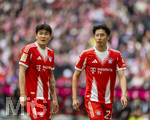 19.04.2026, Fussball Bundesliga 2025/2026, 30.Spieltag, FC Bayern München - VfB Stuttgart, in der Allianz-Arena München, v.li: Min-jae Kim (Bayern München, Minjae Kim) und Hiroki Ito (FC Bayern München) 