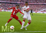 19.04.2026, Fussball Bundesliga 2025/2026, 30.Spieltag, FC Bayern München - VfB Stuttgart, in der Allianz-Arena München, v.li: Michael Olise (FC Bayern München) gegen Jamie Leweling (Stuttgart) 