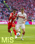 19.04.2026, Fussball Bundesliga 2025/2026, 30.Spieltag, FC Bayern München - VfB Stuttgart, in der Allianz-Arena München, v.li: Michael Olise (FC Bayern München) gegen Ramon Hendriks (Stuttgart) 
