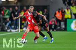 22.04.2026, Fussball DFB-Pokal  2025/2026 Halbfinale, Bayer Leverkusen - FC Bayern München, in der BayArena Leverkusen. Konrad Laimer (FC Bayern München)  , Nathan Tella (Bayer Leverkusen)  