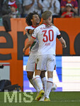 25.04.2026, Fussball 1. Bundesliga 2025/2026, 31.Spieltag, FC Augsburg - Eintracht Frankfurt, in der WWK-Arena Augsburg. Torjubel v.l. Han-Noah Massengo (FC Augsburg) und Anton Kade (FC Augsburg) 
 

