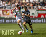 25.04.2026, Fussball 1. Bundesliga 2025/2026, 31.Spieltag, FC Augsburg - Eintracht Frankfurt, in der WWK-Arena Augsburg. v.re: Can Uzun (Eintracht Frankfurt) gegen Cedric Adrian Zesiger (FC Augsburg)  