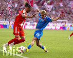 02.05.2026, Fussball Bundesliga 2025/2026, 32.Spieltag, FC Bayern München - 1.FC Heidenheim, in der Allianz-Arena München, v.li: Michael Olise (FC Bayern München) gegen Hennes Behrens (1.FC Heidenheim) 