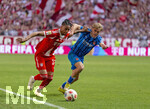 02.05.2026, Fussball Bundesliga 2025/2026, 32.Spieltag, FC Bayern München - 1.FC Heidenheim, in der Allianz-Arena München, v.li: Michael Olise (FC Bayern München) gegen Hennes Behrens (1.FC Heidenheim) 
