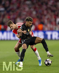 06.05.2026, Fussball UEFA Championsleague 2025/2026: Halbfinale Rückpiel,  FC Bayern München - Paris St. Germain, in der Allianz-Arena München, hi: Josip Stanisic (Bayern München) gegen Desire Doue (FC Paris Saint-Germain) 