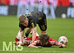 16.05.2026, Fussball Bundesliga 2025/2026, 34.Spieltag, FC Bayern München - 1.FC Köln, in der Allianz-Arena München,   v.l. Isak Johannesson (1.FC Köln) gegen Tom Bischof (Bayern München) 


