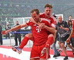 23.05.2026, Fussball DFB-Pokal 2025/2026, Finale, FC Bayern München - VfB Stuttgart, im Olympiastadion Berlin. v.l. Harry Kane (FC Bayern München), Joshua Kimmich (FC Bayern München) und Luis Diaz (FC Bayern München) jubeln

