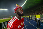 23.05.2026, Fussball DFB-Pokal 2025/2026, Finale, FC Bayern München - VfB Stuttgart, im Olympiastadion Berlin. Jubel bei den Bayern nach dem Gewinn des DFB-Pokals, Dayot Upamecano (FC Bayern München) mit Bayern-Tuch um den Kopf.