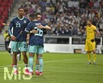 31.05.2026, Fussball Freundschafts-Länderspiele 3.Spieltag, Deutschland - Finnland, in der Mewa-Arena Mainz, v.l. Felix Nmecha (Deutschland), Florian Wirtz (Deutschland) und Deniz Undav (Deutschland) jubeln. Torwart Lukas Hradecky (Finnland) ist enttäuscht.