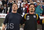 31.05.2026, Fussball Freundschafts-Länderspiele 3.Spieltag, Deutschland - Finnland, in der Mewa-Arena Mainz,  von links:  Bundestrainer Julian Nagelsmann (Deutschland), Co-Trainer Benjamin Hübner (Deutschland) singen die Nationalhymne kräftig mit. 