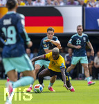 25.06.2026, Fussball Weltmeisterschaft 2026 in den USA, 3.Spieltag Gruppe E, Ecuador - Deutschland, im MetLife Stadium (New York/New Jersey, East Rutherford), Moises CAICEDO (Equador) gegen Florian Wirtz (hi, Deutschland) 