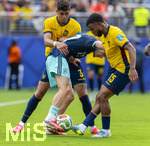 25.06.2026, Fussball Weltmeisterschaft 2026 in den USA, 3.Spieltag Gruppe E, Ecuador - Deutschland, im MetLife Stadium (New York/New Jersey, East Rutherford), von links:  Piero Hincapie (Equador), Florian Wirtz (Deutschland), Pedro VITE (Equador) 