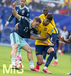 25.06.2026, Fussball Weltmeisterschaft 2026 in den USA, 3.Spieltag Gruppe E, Ecuador - Deutschland, im MetLife Stadium (New York/New Jersey, East Rutherford), von links:  Florian Wirtz (Deutschland), Piero Hincapie (Equador), 