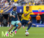 25.06.2026, Fussball Weltmeisterschaft 2026 in den USA, 3.Spieltag Gruppe E, Ecuador - Deutschland, im MetLife Stadium (New York/New Jersey, East Rutherford), von links:  Florian Wirtz (Deutschland), Kevin Rodriguez (Ecuador)