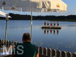 21.07.2026, Der Moorsee Elbsee bei Aitrang im Allgäu, am Elbseerestaurant spielen die Günztaler Alphornbläser aus Markt Rettenbach (Unterallgäu) auf einem Floß heimatliche Klänge in idyllischer Umgebung.   