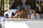 27.07.2026, Fussball Bundesliga 2026/2027, Trainingslager FC Bayern München in Rottach-Egern am Tegernsee (Bayern).  re: Nina Neuer am Sportplatz. Die Frau von Torwart Manuel Neuer (FC Bayern München) mit Sohn Luca Neuer im kompletten FC Bayern Torhüter Outfit seines Papas, mit Mannschaftsarzt Dr. Jürgen Hahne (FC Bayern).! Achtung: KEINE FREIGABE FÜR VERÖFFENTLICHUNG JEDER ART !!