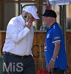 30.07.2026, Fussball Bundesliga 2026/2027, Trainingslager FC Bayern München in Rottach-Egern am Tegernsee (Bayern). Testspiel FC Rottach Egern - FC Bayern München,   Ehren-Präsident Uli Hoeneß (FC Bayern München, Hoeness) telefoniert.  